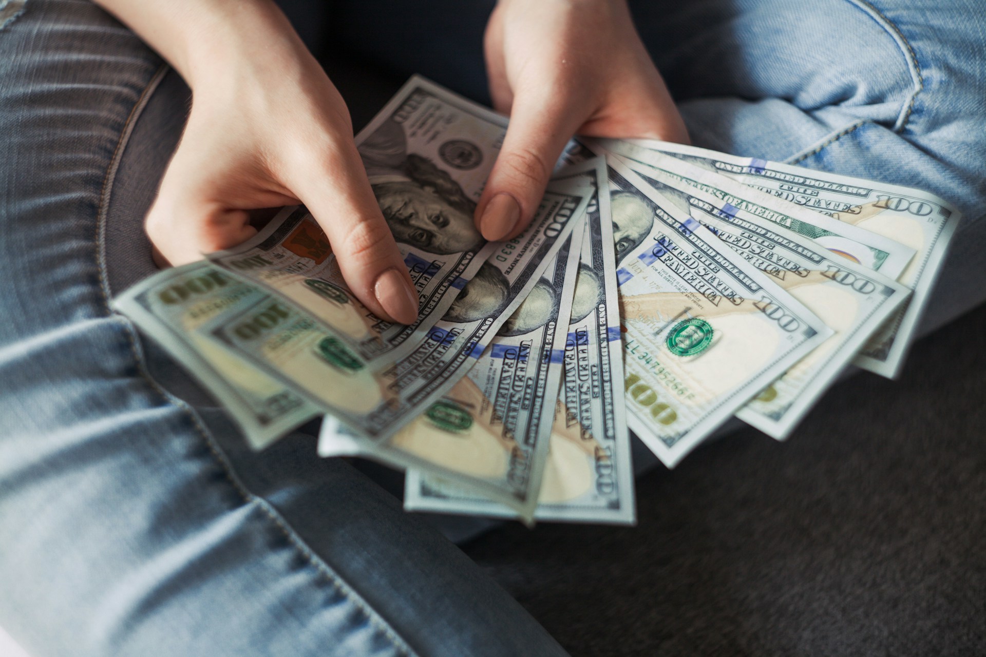 Money slipping through hands